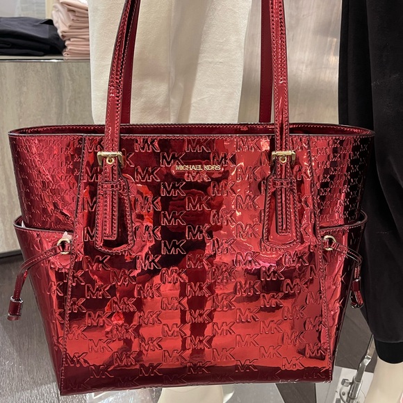 MICHAEL KORS Voyager Lg Metallic Logo Debossed EW Shoulder Tote Bag
Cherry 
NWT - Picture 3 of 16